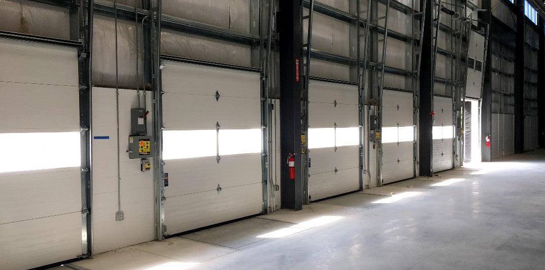 Tips for Maintaining Your Warehouse Dock Doors - Excel Solutions