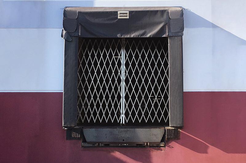 Heavy-Duty Dual-Folding Security Gate - Excel Solutions